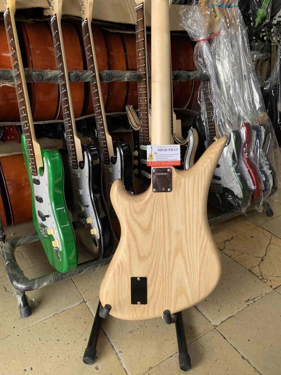 dan-guitar-dien-tesico-go-tu-nhien-cao-cap (1)