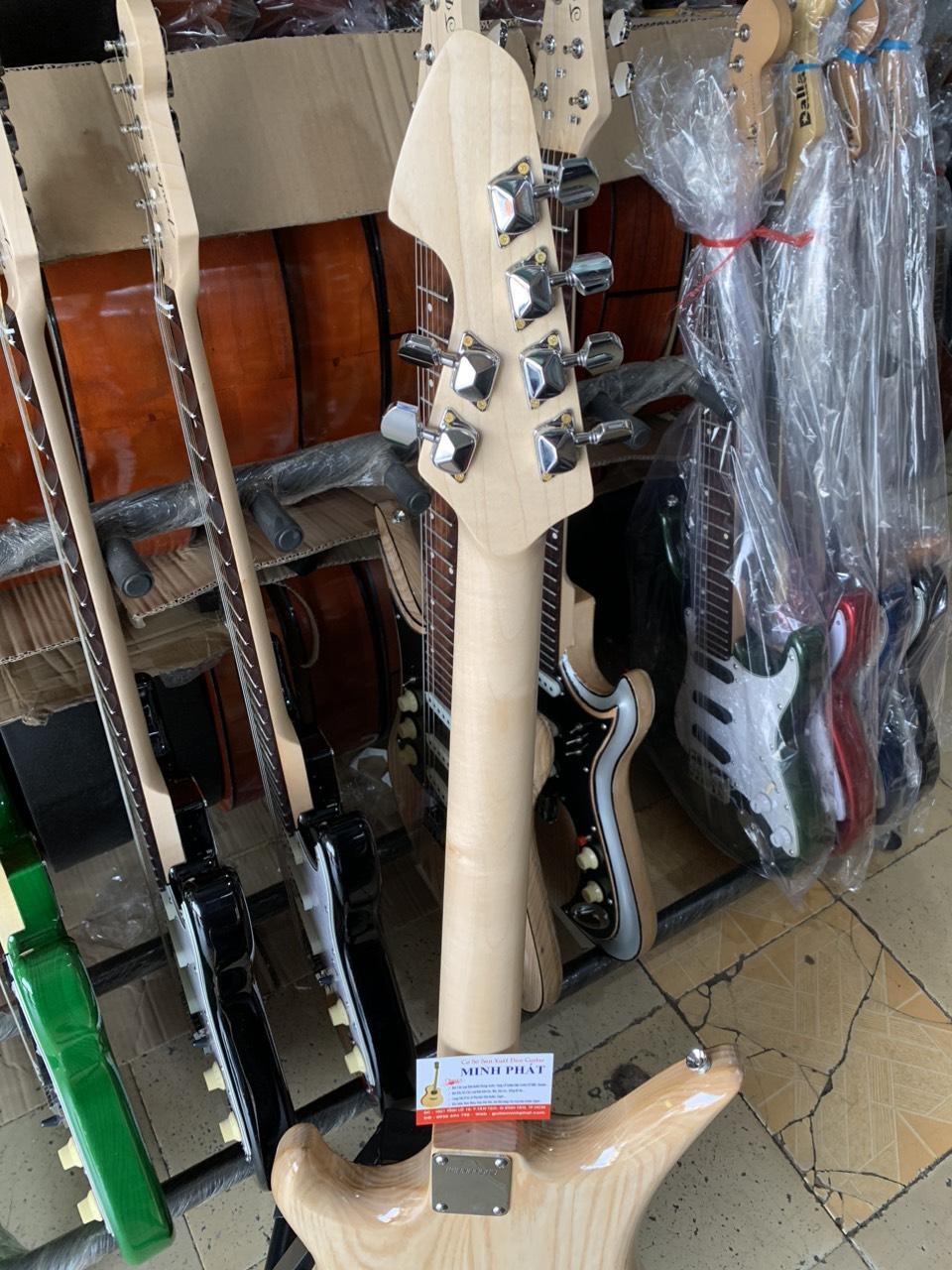 dan-guitar-dien-tesico-go-tu-nhien-cao-cap (2)