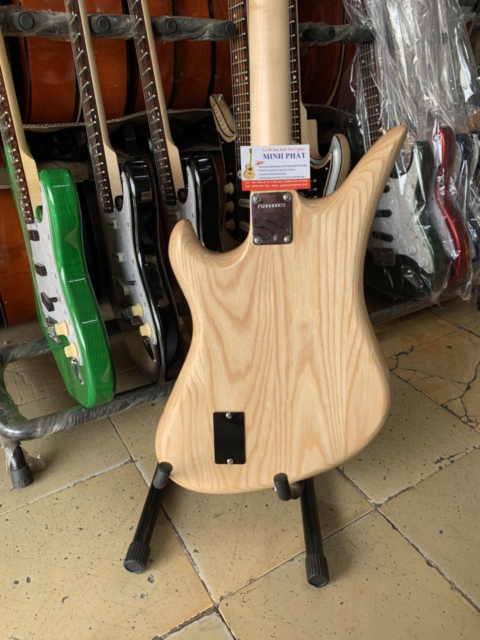 dan-guitar-dien-tesico-go-tu-nhien-cao-cap (4)