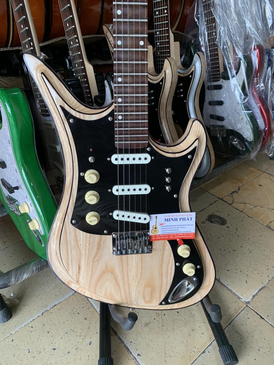 dan-guitar-dien-tesico-go-tu-nhien-cao-cap (6)