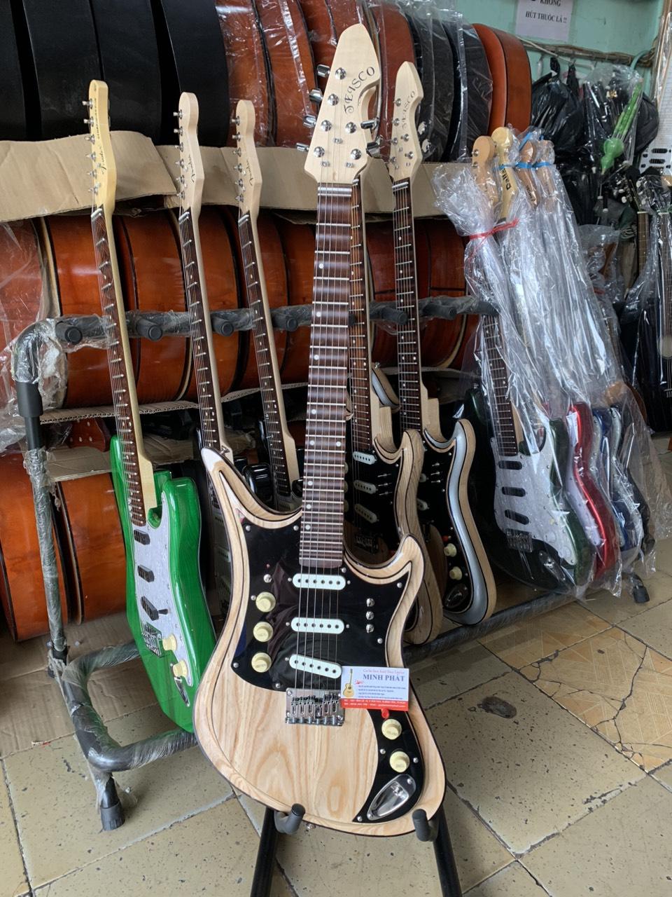 dan-guitar-dien-tesico-go-tu-nhien-cao-cap (7)